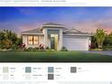 Charming single-story home showcasing architectural details, a well-kept lawn, and a welcoming two-car garage at 12996 Morning Mist Pl, Venice, FL 34293