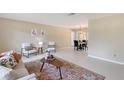 Bright living room with neutral walls, modern furniture, and an open floor plan at 3127 Dawson St, Sarasota, FL 34239