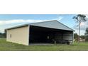 Large barn perfect for storage, workshop, or hobby space at 4353 Hidden River Rd, Sarasota, FL 34240