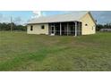 Lovely single-story home featuring a screened-in patio and spacious backyard at 4353 Hidden River Rd, Sarasota, FL 34240