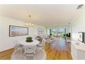 Bright, open floorplan featuring a dining area and living room with gorgeous water view at 4736 Independence Dr # 4736, Bradenton, FL 34210