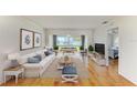 Relaxing living room boasts an open and airy layout, creating a seamless flow for modern living at 4736 Independence Dr # 4736, Bradenton, FL 34210