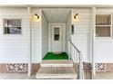 Close-up view of the front entrance with visible house number and classic details at 5619 Bayshore Rd # 203, Palmetto, FL 34221
