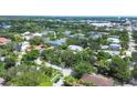 Neighborhood aerial view highlighting charming homes, mature trees, and streetscapes at 3837 Camino Real, Sarasota, FL 34239