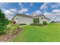 Charming home with a well-manicured lawn and attractive landscaping, creating great curb appeal at 4625 Canoe Creek Ave, Parrish, FL 34219