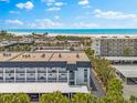 The complex is near the beach; great view, parking, and the property is surrounded by mature palms at 5600 Beach Way Dr # 201, Sarasota, FL 34242