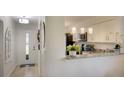 Charming entryway and kitchen featuring modern appliances and stylish decor at 6024 28Th W St, Bradenton, FL 34207
