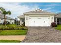 Charming single-story home with a spacious two-car garage and well-maintained landscaping at 8148 Sternway Rd, Sarasota, FL 34240