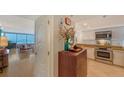Open kitchen featuring stainless steel appliances and a seamless flow into the living area at 988 Blvd Of The Arts # 1016, Sarasota, FL 34236