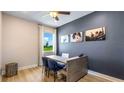 Stylish office with hardwood floors, a modern desk, and large window offering pleasant views at 17924 Tavernside Trl, Bradenton, FL 34211