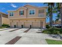 A well-maintained townhome with a private garage and neutral color scheme at 3402 Parkridge Cir, Sarasota, FL 34243