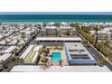 Well-maintained community featuring condos, a pool, shuffleboard, and covered parking near the ocean at 3806 Gulf Of Mexico Dr # C204, Longboat Key, FL 34228