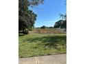 Open, grassy area featuring a marshy wetland, creating a peaceful natural habitat within the community at 10800 N Us Highway 19 # 237, Pinellas Park, FL 33782