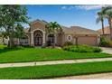 Attractive single-Gathering home with a manicured lawn, mature landscaping, and neutral color scheme at 730 Old Quarry Rd, Bradenton, FL 34212