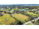 Expansive property with a white-fenced yard, a beautiful pond, and stunning views of the surrounding landscape at 2005 21St W St, Palmetto, FL 34221
