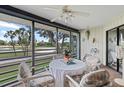 Screened lanai provides a tranquil seating area with views of the golf course at 3500 El Conquistador Pkwy # 132, Bradenton, FL 34210