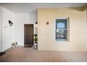 Hallway view features unit numbers, door, and a view of outdoor at 525 N Orange Ave # 302, Sarasota, FL 34236
