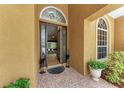 Inviting front entryway with decorative tile flooring, sidelights and a view to the living room at 5359 90Th Avenue E Cir, Parrish, FL 34219