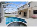Screened-in pool, covered patio, a backyard great for entertaining and relaxing at 5981 Willows Bridge Loop, Ellenton, FL 34222