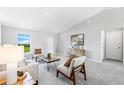 Cozy living space featuring neutral tones, lots of natural light and modern decor at 7295 Donahue St, Port Charlotte, FL 33981