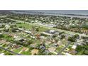 Aerial view showing proximity to the open bay in a residential neighborhood at 107 Van Dyck Dr, Nokomis, FL 34275