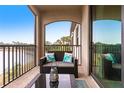 Relax on the balcony with seating and enjoy the lovely water view at 16804 Vardon Ter # 307, Bradenton, FL 34211