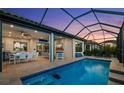 Enjoy the outdoors with this screened-in pool and lanai, ideal for relaxing or entertaining guests at 4720 Arpino Ct, Bradenton, FL 34211