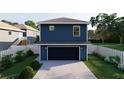 Rear elevation of a two-story home with a convenient built-in garage and driveway at 4755 11Th S Ave, St Petersburg, FL 33711