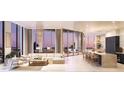 Modern living room with floor-to-ceiling windows, sleek furniture, and an open-concept design at 290 Cocoanut Ave # 8B, Sarasota, FL 34236