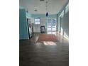 Bright kitchen with stainless steel appliances and light blue walls at 3339 Duar Ter, North Port, FL 34291