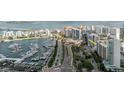 Scenic aerial showcasing waterfront condos, marina, and bay views at 1255 N Gulfstream Ave # 1104, Sarasota, FL 34236