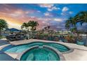 Inviting pool and spa with views of the waterfront community, perfect for relaxation at 4508 Mangrove Point Rd, Bradenton, FL 34210
