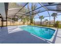 Screened-in pool area featuring a beautiful pool, enclosed for year-round enjoyment at 7442 N Leewynn Dr, Sarasota, FL 34240