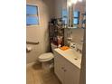 Compact bathroom featuring a vanity, a single sink, and tile flooring at 1506 S 78Th S St, Tampa, FL 33619