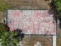Aerial shot of a fenced in basketball court with two hoops ready for a game at 15440 County Road 675, Parrish, FL 34219