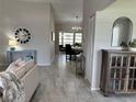 Inviting hallway features neutral paint colors, attractive floors, and leads to the dining area at 3703 39Th Street W # 11, Bradenton, FL 34205