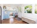 Entryway featuring hardwood floors, a decorative front door, and a castle-themed play area at 717 84Th Nw St, Bradenton, FL 34209