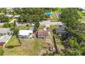Aerial view of a modest residence near a park with vibrant playground equipment at 2558 Hawthorne St, Sarasota, FL 34239