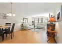 Inviting living room featuring neutral decor, comfortable seating, and abundant natural light at 3802 Gulf Of Mexico Dr # A205, Longboat Key, FL 34228