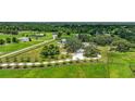 A sprawling estate includes a home, a barn, and fenced pastures, providing ample space and privacy at 6875 Myakka Valley Trl, Sarasota, FL 34241