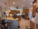 Spacious kitchen with granite countertops, stainless steel appliances, and ample cabinet space at 14714 5Th Ne Ter, Bradenton, FL 34212