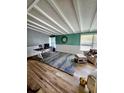 Well lit office with wood floors, desk, and overhead lighting at 3727 Dover Dr, Sarasota, FL 34235