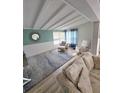 Bright office with a sitting area, natural light, and overhead lighting at 3727 Dover Dr, Sarasota, FL 34235