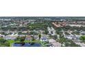Scenic aerial view of a residential community with lush greenery and multiple ponds at 6043 44Th E Ct, Bradenton, FL 34203