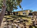 A single-story home with an open backyard at 5615 Waneta Pl, Sarasota, FL 34231