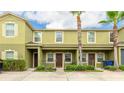 Townhome exterior featuring well maintained landscaping and hardscape at 1426 Harbour Blue St, Ruskin, FL 33570