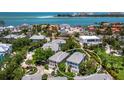 Beautiful aerial view showcasing this waterfront neighborhood with the ocean coastline at 3959 Somerset Dr # 5, Sarasota, FL 34242
