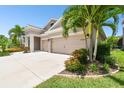 Charming single-Gathering home with a two-car garage and lush landscaping in a desirable neighborhood at 5802 Alabaster Stone Ln, Apollo Beach, FL 33572