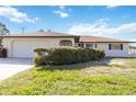 Single-story home with a well-manicured lawn and a one car garage at 1163 Nantucket Rd, Venice, FL 34293