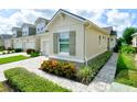 A charming home featuring well-maintained landscaping and beautiful exterior at 3681 Divot Ln, Sarasota, FL 34232
